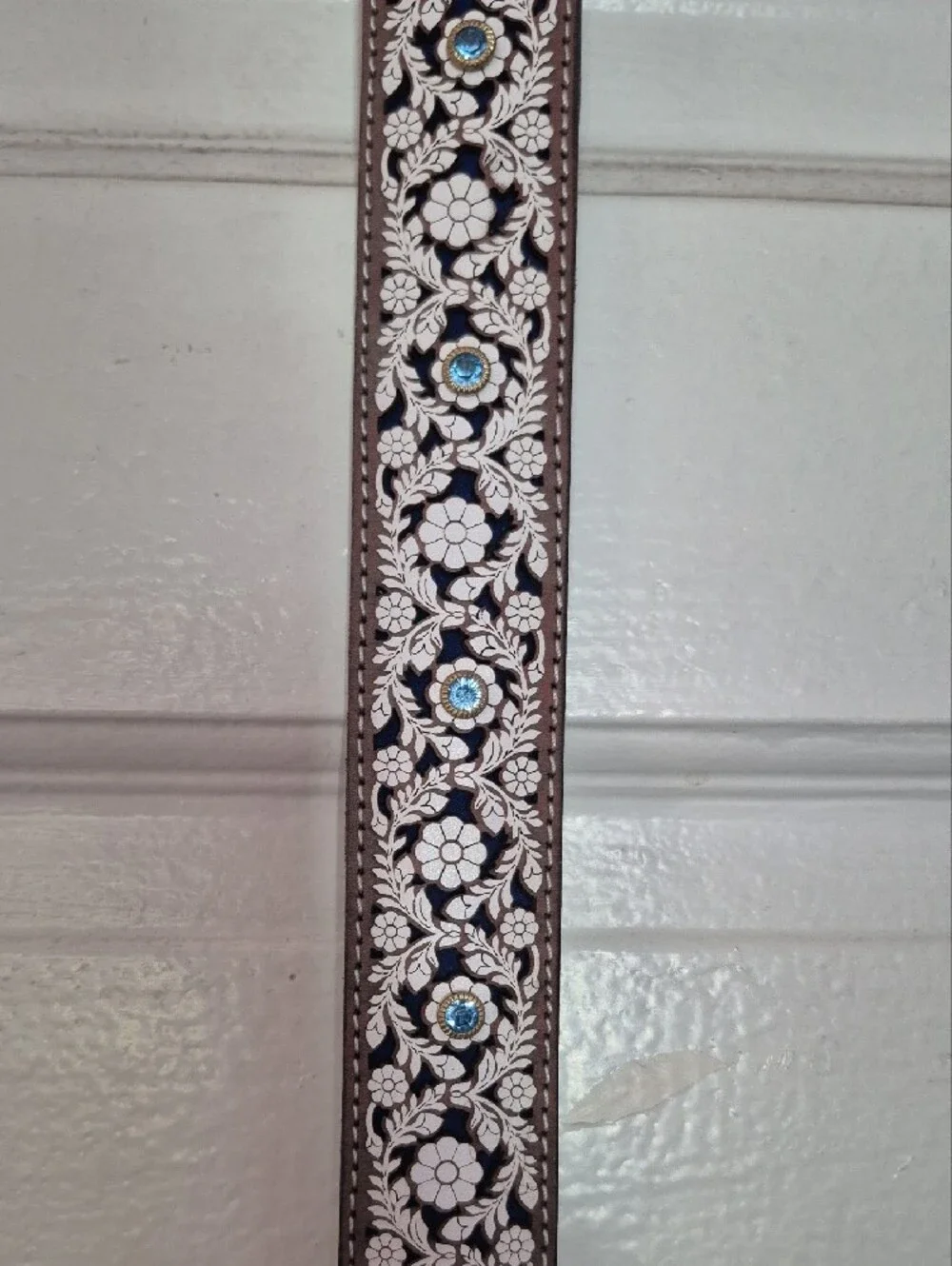 White Floral Tooled Belt with Silver Buckle